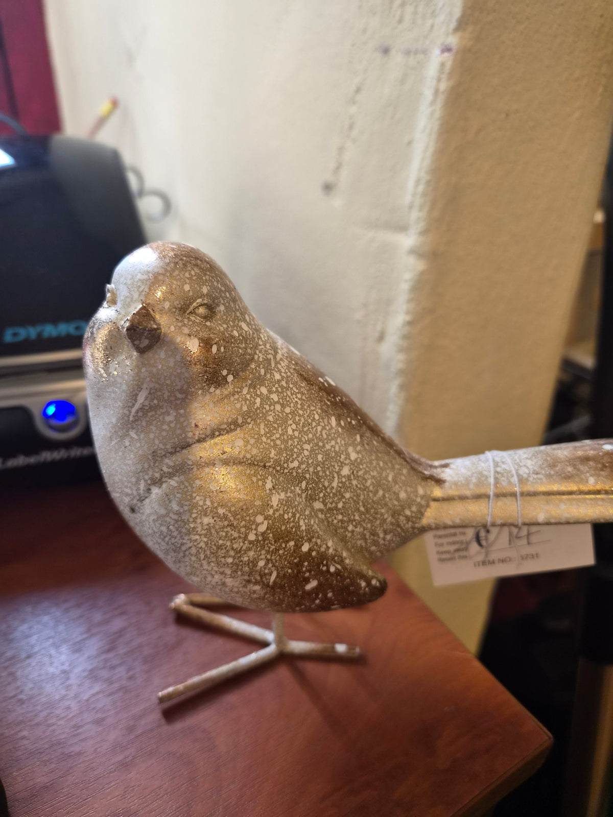 Gold Bird Facing Right
