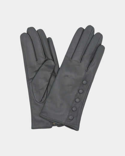 Ladies leather gloves on neutral background