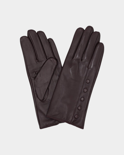 Ladies leather gloves on neutral background