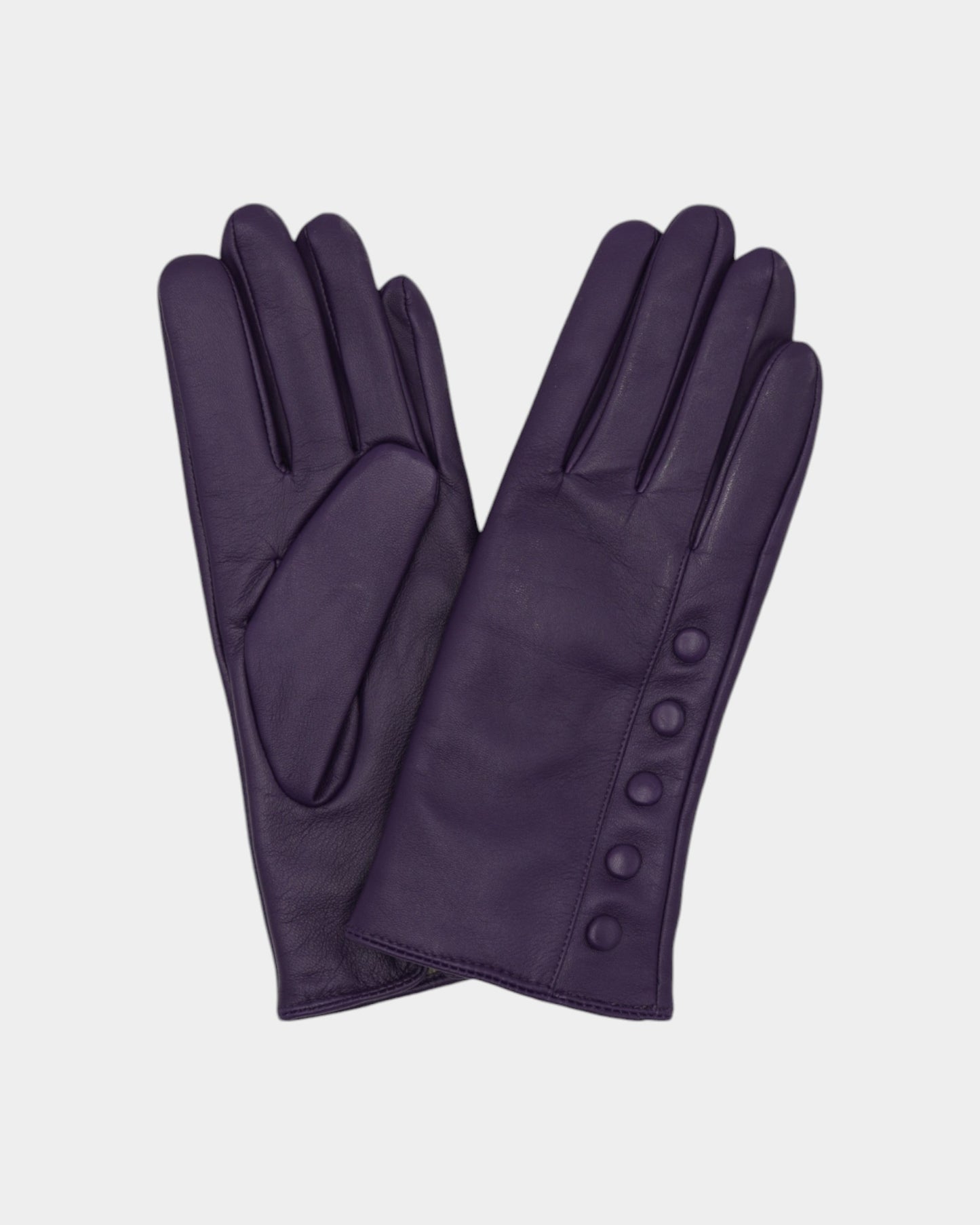 Ladies leather gloves on neutral background